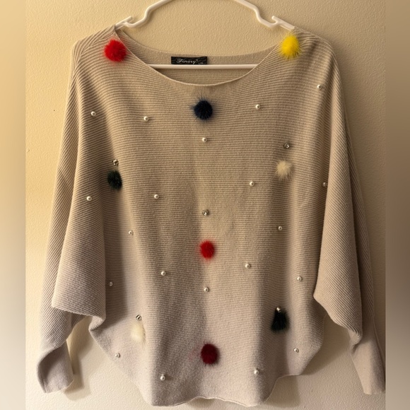 Elegant Cream Sweater with Colorful Pom Pom Accents. - Picture 1 of 8